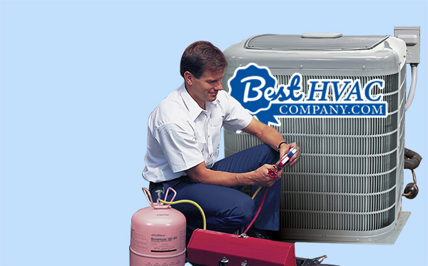 Best HVAC company installer servicing heat pumpFairhope, AL HVAC installer servicing heat pump with logo